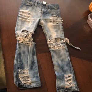 Like new !!!! Custom made distressed jeans..